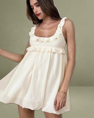 Garistha Babydoll Puffball Mini Dress in Cream
